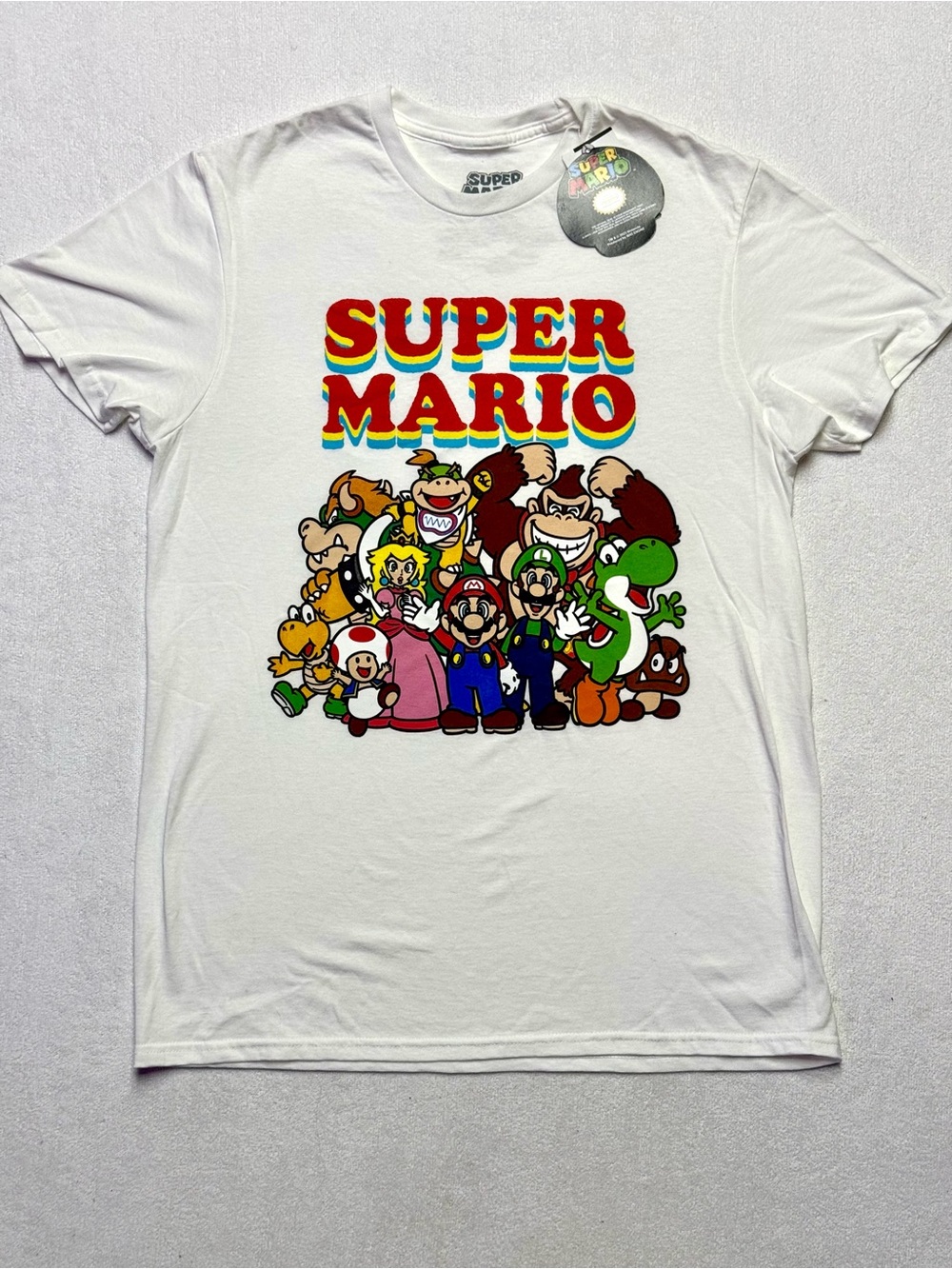 Super Mario Nintendo White Tee with Multicolor Retro SUPER MARIO Print